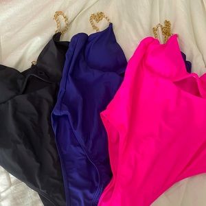 Large bathing suits 3 piece set. Never worn.